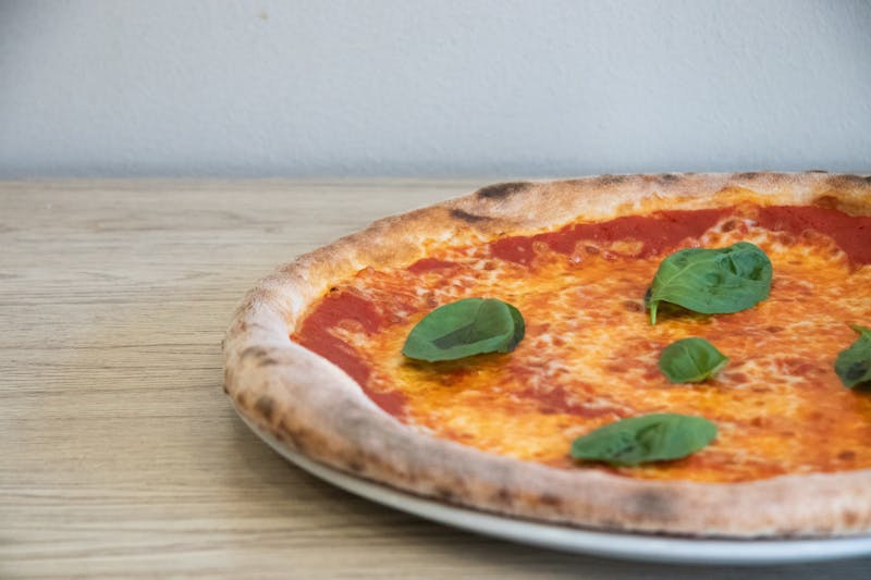 Classic Margherita Pizza with fresh tomato and basil