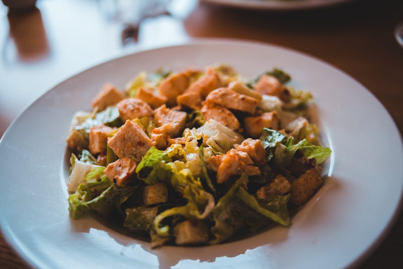 Fresh Caesar salad with crispy croutons and parmesan